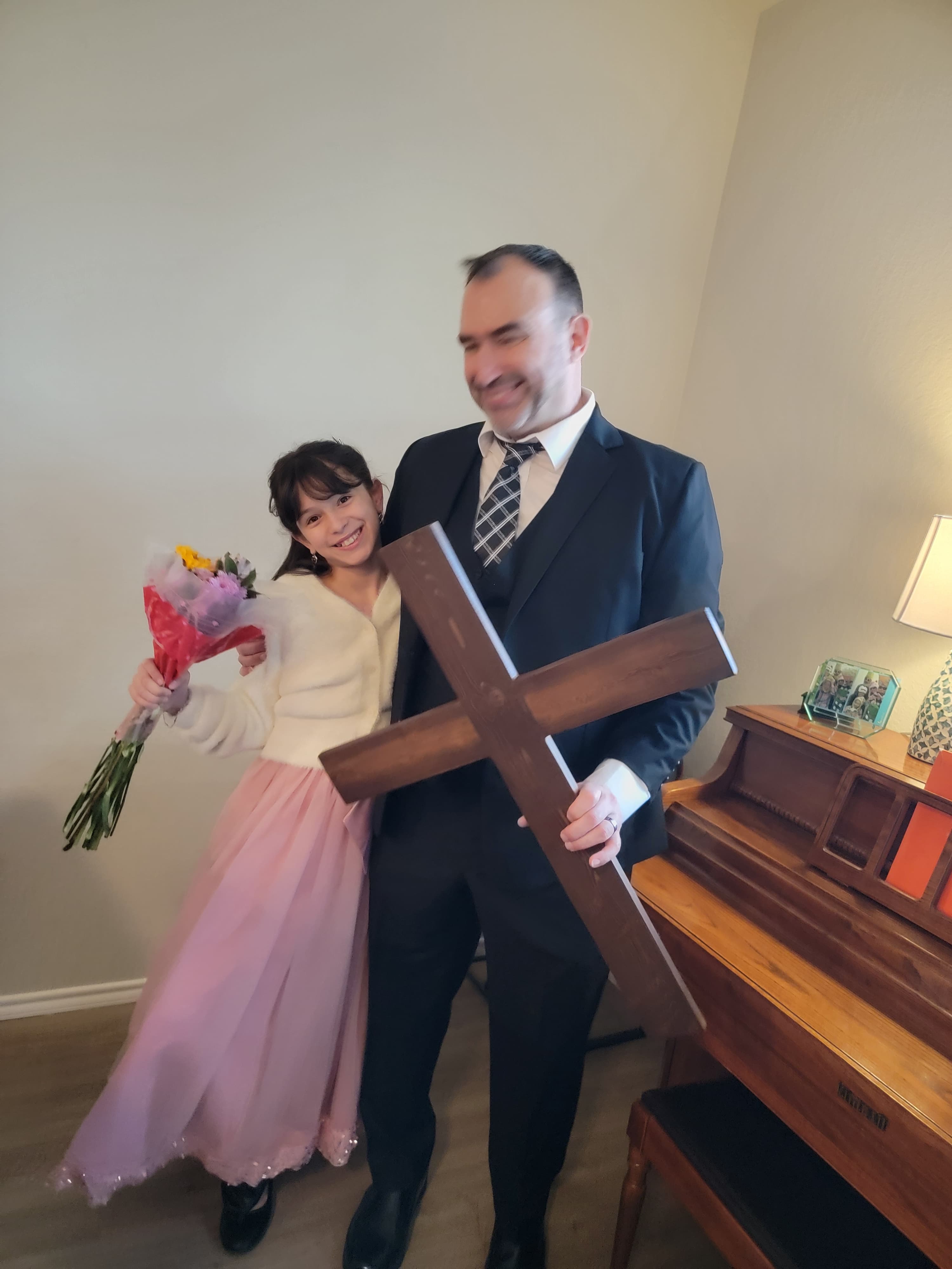 James and his daughter with the cross